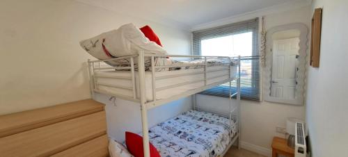 Postel nebo postele na pokoji v ubytování Ocean Breeze