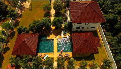 an overhead view of a house with a swimming pool at Big Villa 3 at CET Resort Rayong Padelcenter in Klaeng