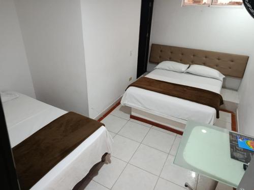Postel nebo postele na pokoji v ubytování Hotel Bayadera Real