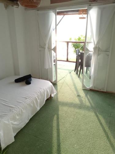Postel nebo postele na pokoji v ubytování La playita ocean view