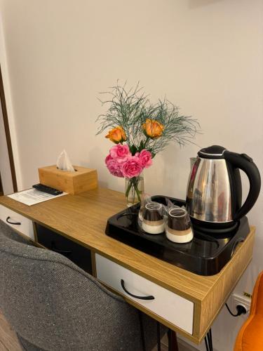 Pensiunea PORTAS RESORTにあるコーヒーまたはお茶