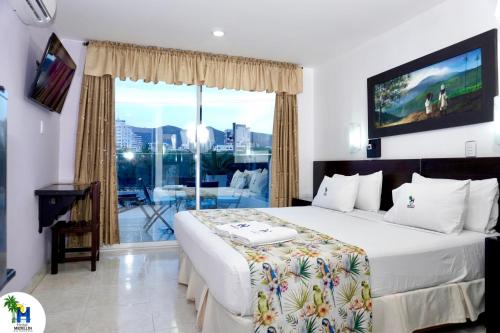 Katil atau katil-katil dalam bilik di Hotel Medellín Rodadero