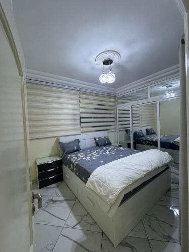 מיטה או מיטות בחדר ב-App 1 Residence Luxury