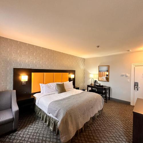 Ένα ή περισσότερα κρεβάτια σε δωμάτιο στο The Gananoque Inn
