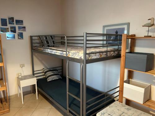 Postel nebo postele na pokoji v ubytování Dai tre aratri rossi