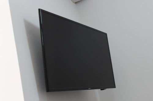 TV a/nebo společenská místnost v ubytování Lofts Sayula Independencia