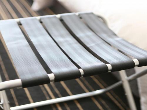 a close up of a black and white chair at APA Hotel Kagoshima Tenmonkan in Kagoshima