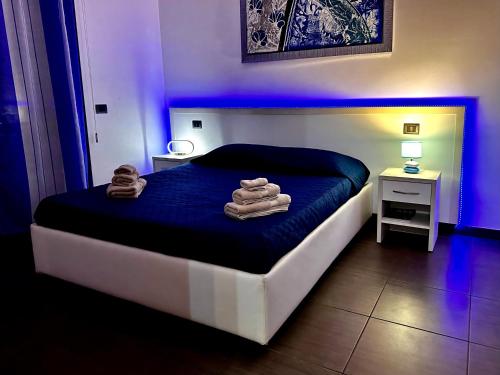 En eller flere senge i et værelse på Dream & Fly Darsena