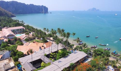 an aerial view of a beach with boats in the water at Vacation Village Phra Nang Inn - SHA Extra Plus in Ao Nang Beach