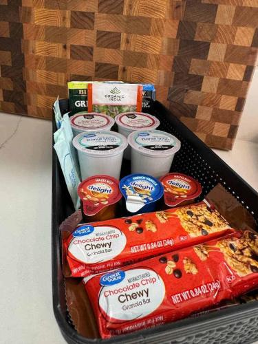 a black container filled with different types of food at Lilly Pad Landing in Hazelhurst