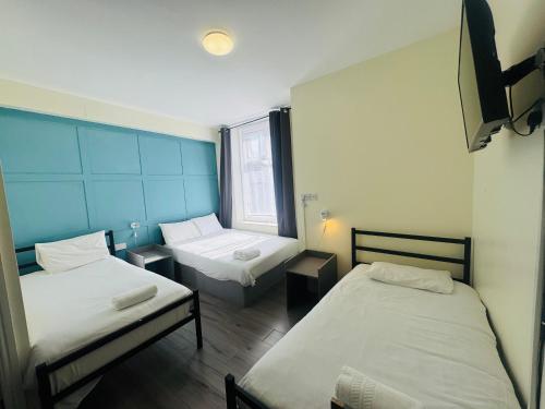 Calypso hotel Blackpoolにあるベッド