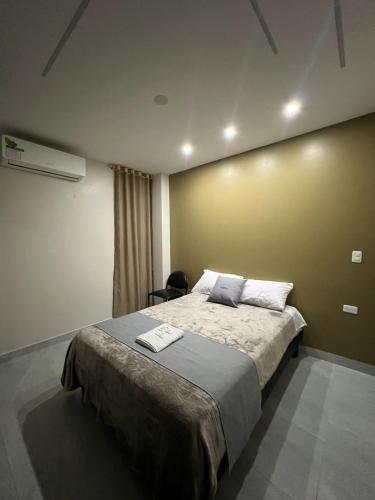 Postel nebo postele na pokoji v ubytování Hotel Tonaka
