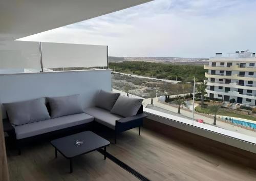 Ein Balkon oder eine Terrasse in der Unterkunft Costa Blanca Beach Apartment