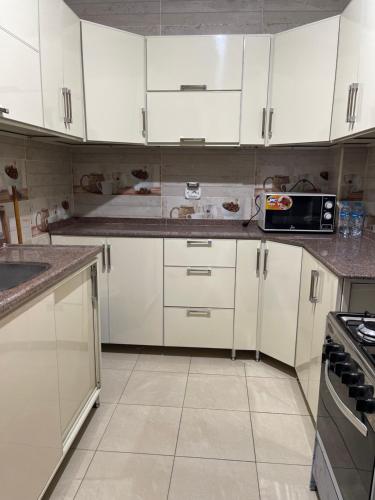 Кухня или мини-кухня в شقة فندقية
