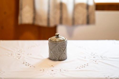 a small container sitting on top of a table at Triad Ferienhäuschen Stöckl in Bad Schönau