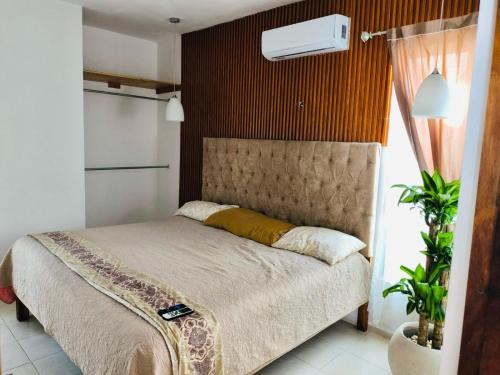 Postel nebo postele na pokoji v ubytování Casa Lilieth Premium en Valladolid