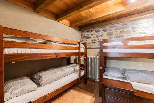 Postel nebo postele na pokoji v ubytování Rifugio Ca' da Cardella