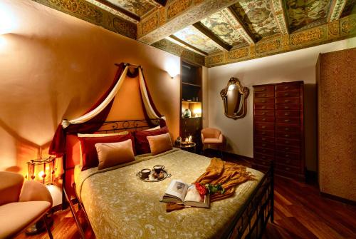Katil atau katil-katil dalam bilik di House of Magic - Due Torri