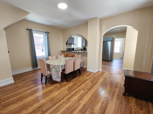 a kitchen and dining room with a table and chairs at The Delancy House-Near the Bay, Casinos &Boardwalk in Atlantic City
