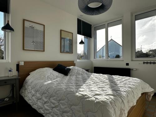 Postel nebo postele na pokoji v ubytování À700m de la mer appartement avec terrasse, parking l'alouette