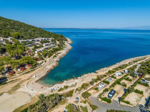 an aerial view of a beach and the ocean at Sea view Anika by Vellaris, Luxury Mobile Home in Mali Lošinj