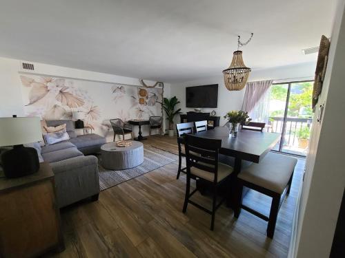 a living room with a table and a dining room at Willow Breeze-Near Casinos, Boardwalk & Water Park in Atlantic City