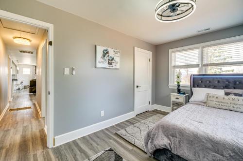 a bedroom with a bed and a window at 5 Mi to Dtwn Family-Friendly Home in Roanoke! in Roanoke
