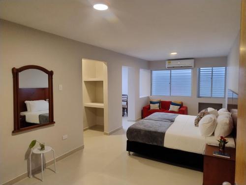 Voodi või voodid majutusasutuse Hotel Dorado Plaza Getsemaní toas