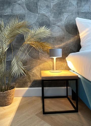 Ein Bett oder Betten in einem Zimmer der Unterkunft Boutique Hotel At Sea