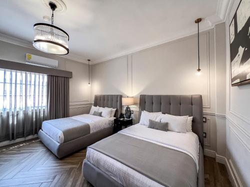 Postel nebo postele na pokoji v ubytování Hotel Mansion E Borbon