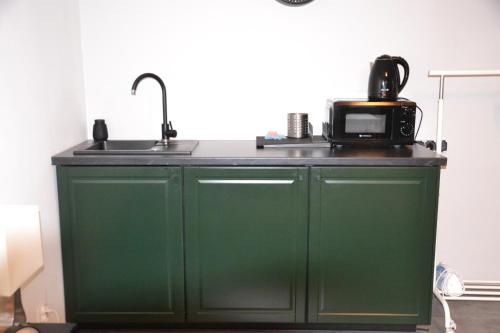 Kuchyň nebo kuchyňský kout v ubytování Rooms Silesia