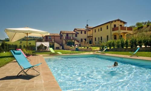 The swimming pool at or close to Borgo Le Capannelle