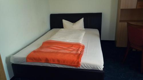Postel nebo postele na pokoji v ubytování Hotel Al Cavallino