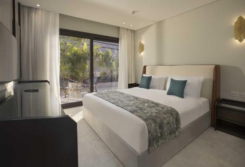 Postel nebo postele na pokoji v ubytování V Hotel Sharm El Shiekh