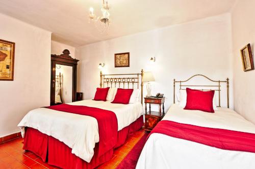 Postel nebo postele na pokoji v ubytování El Hotel de Su Merced