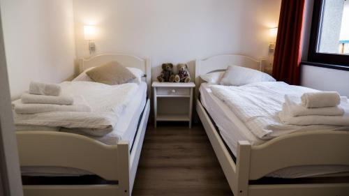 Hotel B&B Francoliniにあるベッド