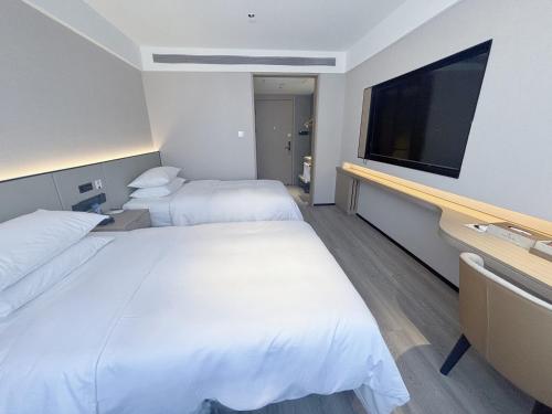 Gambar di galeri bagi Jiyuefeng Xingfuli Hotel di Weihai