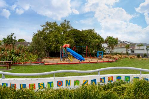 a playground with a slide in a park at Bright & Spacious 2BR near Ara Institute and CBD in Christchurch