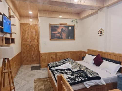 Postel nebo postele na pokoji v ubytování Neo classical