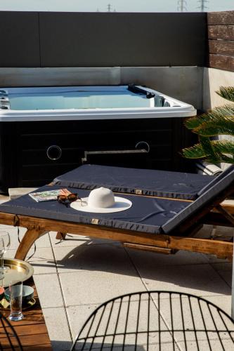 Le rooftop - jacuzzi et climatisation