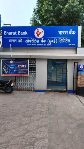 a bank with a sign on the front of it at Hotel Kiara Eshosans Palace in Shirdi