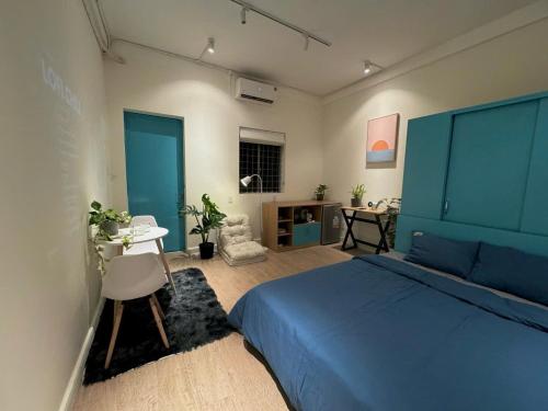 Ένα ή περισσότερα κρεβάτια σε δωμάτιο στο Alis Homestay