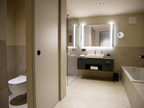Koupelna v ubytování Best Western Premier Hotel Rebstock