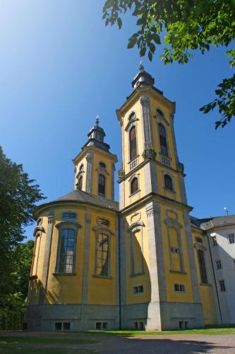 an old building with two towers on top of it at Best Western Premier Parkhotel Bad Mergentheim in Bad Mergentheim