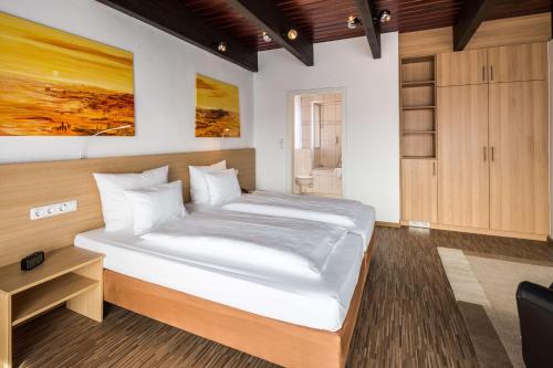 Postel nebo postele na pokoji v ubytování Best Western Hotel Heide