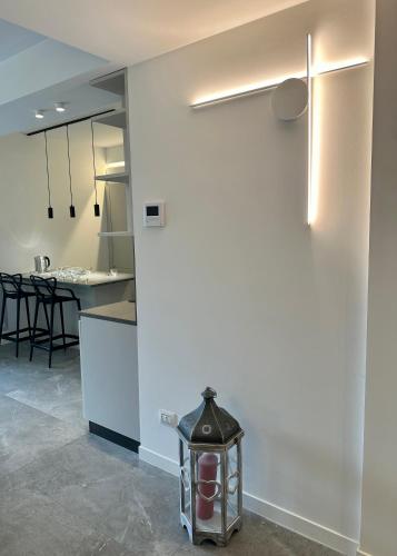 a kitchen and dining room with a stove at Luxury Lake View Apartment - Lake Como - Cernobbio in Cernobbio