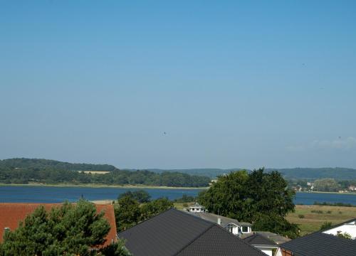 a view of a lake from a roof at Ferienwohnung "Bellevue" in Sellin auf Rügen in Ostseebad Sellin