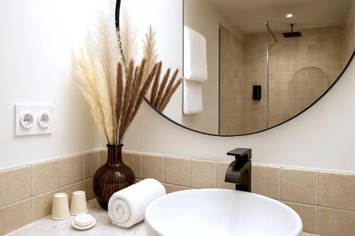 Ένα μπάνιο στο MAYA Appartements & Suites