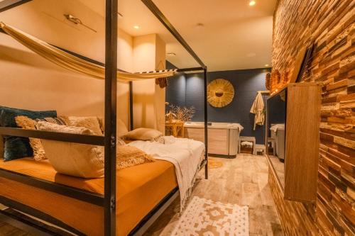 Postel nebo postele na pokoji v ubytování Pandora Spa Lille