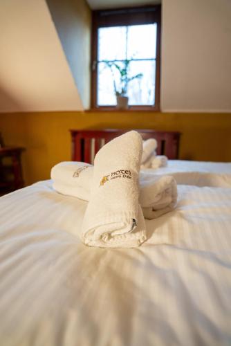 Cama o camas de una habitación en Hotel Horní Dvůr